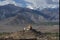 Golden roof monastery and snow mountain range Leh Ladakh ,India