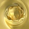 A golden round figure with swirls on a yellow background. An abstraction made of liquid gold. Round textures with sinuous lines.