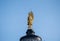 Golden Saint Alexander statue on Bergamo Cathedral Duomo di Bergamo, Cattedrale di Sant`Alessandro roof. Italy