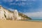 Golden sand beach of Vieste with Pizzomunno rock, Gargano peninsula, Apulia, South of Italy