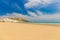 Golden sand beach of Vieste with Pizzomunno rock, Gargano peninsula, Apulia, South of Italy