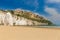 Golden sand beach of Vieste with Pizzomunno rock, Gargano peninsula, Apulia, South of Italy