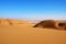 Golden sand dunes in central desert of Iran