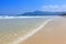 Golden sand and wave beach blue sky daylight landscape