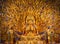 Golden sculpture of Avalokiteshvara Buddha or Guanyin with thousand hands at Dazu Rock Carvings at Mount Baoding or Baodingshan