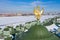 Golden sculpture of a majestic eagle of Russia on the roof of the Winter Palace in Saint-Petersburg. Symbol of the Russian Empire