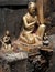 Golden sculpture of praying man at Swayambhunath Stupa. Monkey Temple Nepal, Kathmandu