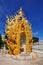 Golden sculpture at Wat Rong Khun temple