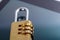 Golden security digital password lock key on tablet
