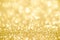 Golden shimmer glitter texture confetti designed background