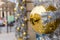 Golden shiny ball on Christmas street in Paris