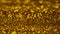 Golden shiny sand, gold sparkles blurred background