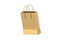 Golden shopping bag isolated on white background.