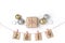Golden, silver balls, gift, candles, notes with wish on clothespins