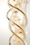 Golden and silver DNA strand - radiant light - scientific discovery and medical marvels concept - generative AI