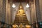 Golden sitting Main Buddha at Wihan Luang in main Prang ofWat Arun Ratchawararam Ratworamahawihan Temple of Dawn .