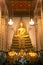 Golden sitting Main Buddha at Wihan Luang in main Prang ofWat Arun Ratchawararam Ratworamahawihan Temple of Dawn .