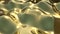 Golden smooth waves on sunset animation. Melted yellow metal liquid.