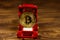 Golden souvenir coin bitcoin in car-shaped gift box for jewelry