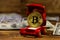 Golden souvenir coin bitcoin in car-shaped gift box for jewelry and dollars