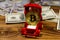 Golden souvenir coin bitcoin in car-shaped gift box for jewelry and dollars on wooden background