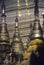 Golden spires of Buddhist stupas in temple
