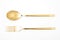 golden spoon and fork isolated on a white