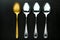 Golden Spoon among ordinary spoons