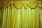Golden stage curtain