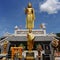 Golden Standing Buddha Statue