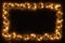 Golden star christams lights on a dark wooden background