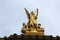 Golden statue of Angel on the top of the Garnier Opera in Paris