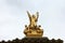 Golden statue of Angel on the top of the Garnier Opera in Paris