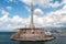 Golden statue of the `Madonna della Lettera` on an obelisk at the entrance of the harbor of Messina Sicily