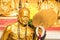 Golden statue of old buddhist monk in Chiang Mai