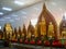 golden statues in a temple in burma