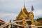 Golden statues of Thai Buddhism temple Wat Khao Din, Pattaya district, Chonburi, Thailand