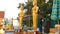 Golden statues of various Buddhist hypostases in a Great Buddha temple complex Pattaya, Thailand