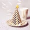 Golden striped cone hat and other party accessories