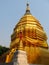 Golden stupa in a Buddhist Temple in Thailand