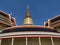 Golden stupa soars into blue sky at Wat Ratchabophit