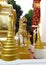 Golden stupa and statue in a Buddhist Temple