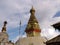 Golden stupas with the eyes of the Buddha in the Swayambhunath Temple, the monkey temple. Kathmandu, Nepal