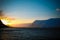 Golden sun rising over the mountains in Antarctica