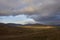 Golden sunlight lighting up the slopes of the hills in the Angus Glens of Scotland on a Septembers evening.