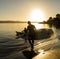 Golden sunrise paddle on the coast