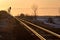 Golden Sunrise on Railway Tracks and Canadian Prairie