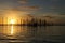 Golden sunset and coloured clouds  seen through Camboa fishing device in Barra Grande Camamu Bay  Bahia Brazil