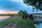 golden sunset on the green rice field during planting season