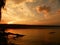 Golden sunset on the lake shore
